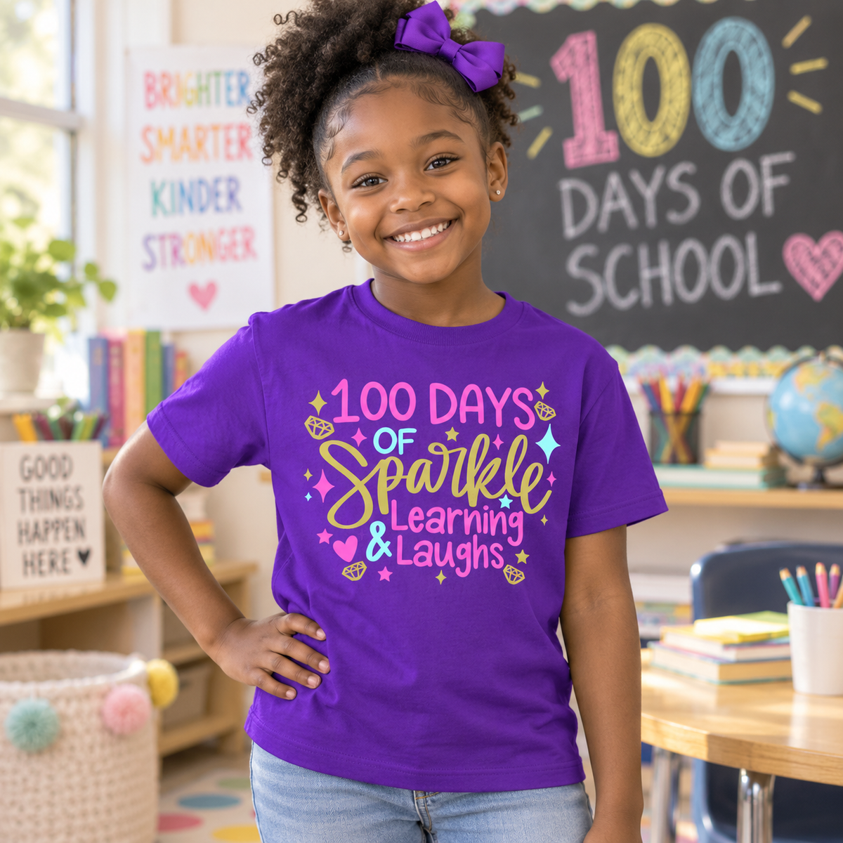 Black girl wearing a purple 100 Days of Sparkle school tee in a classroom