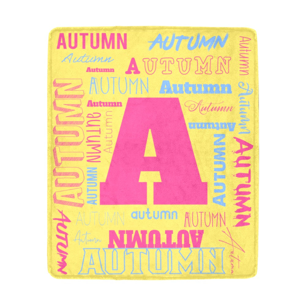 Yellow personalized name and initial microfleece blanket with the name Autumn and letter A