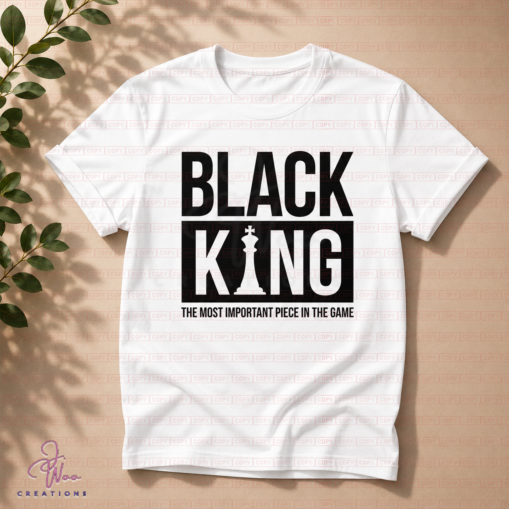 White t-shirt with 'Black King' graphic and text on a beige background