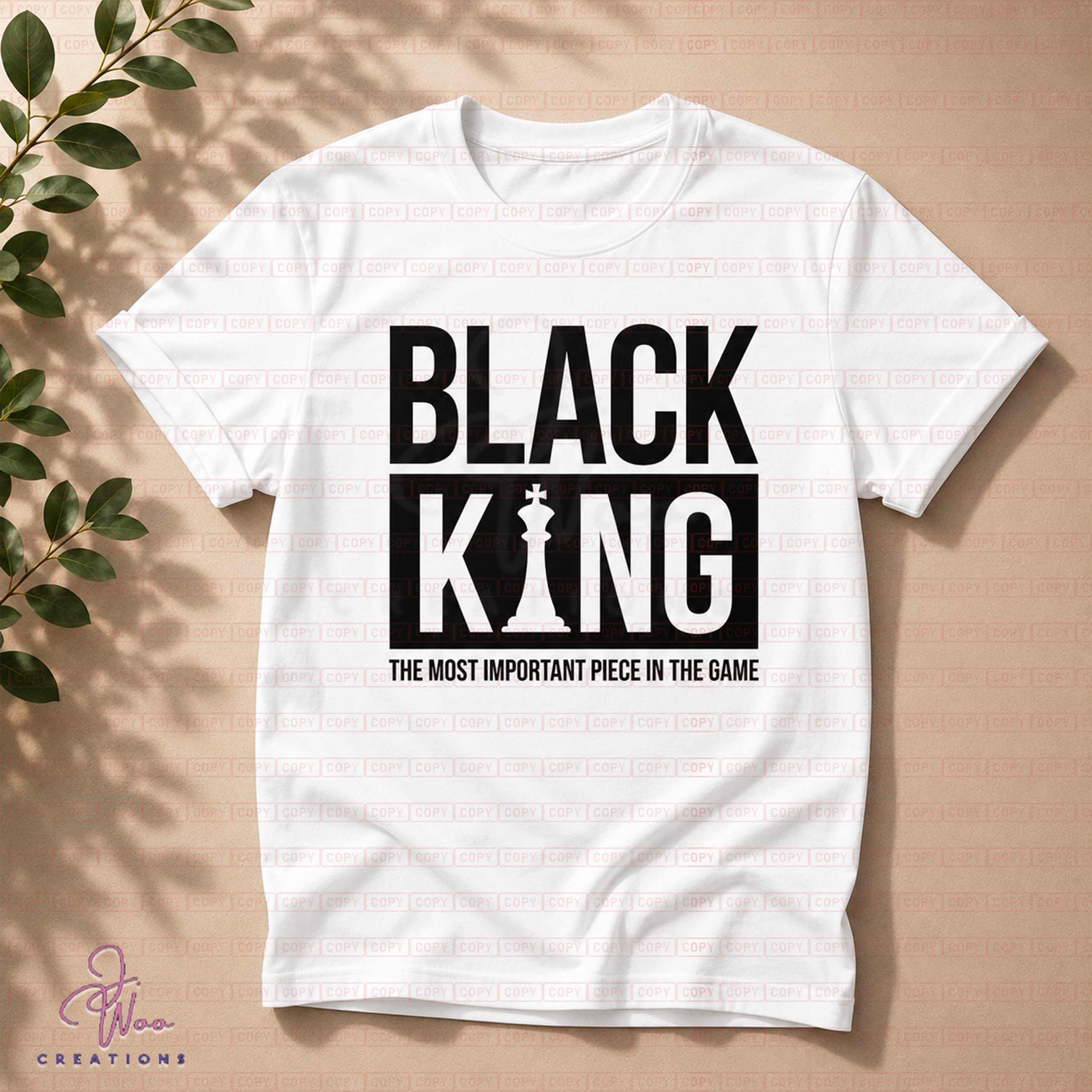 White t-shirt with 'Black King' graphic and text on a beige background