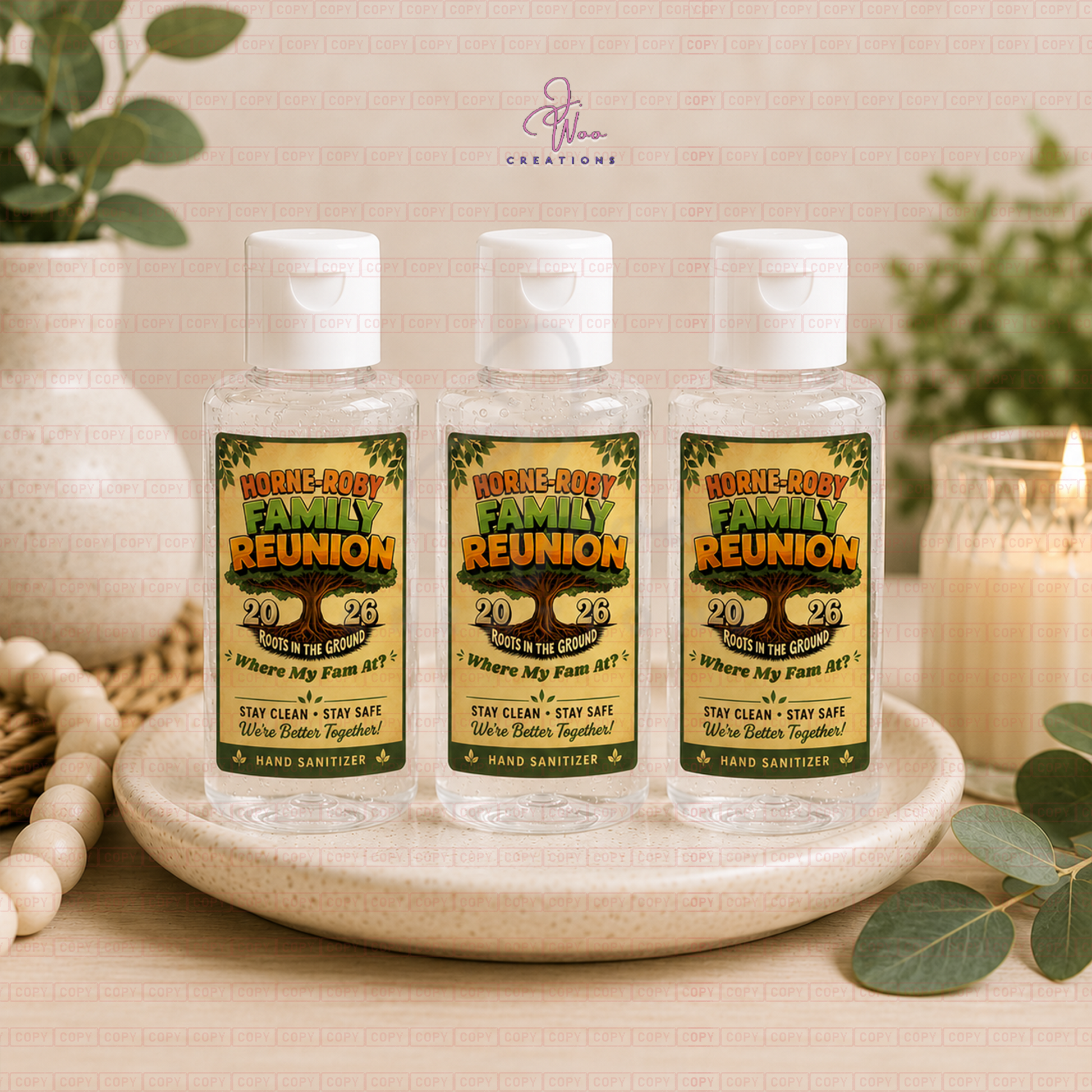 Custom family reunion hand sanitizer labels styled on ceramic tray with eucalyptus - J. Woo Creations
