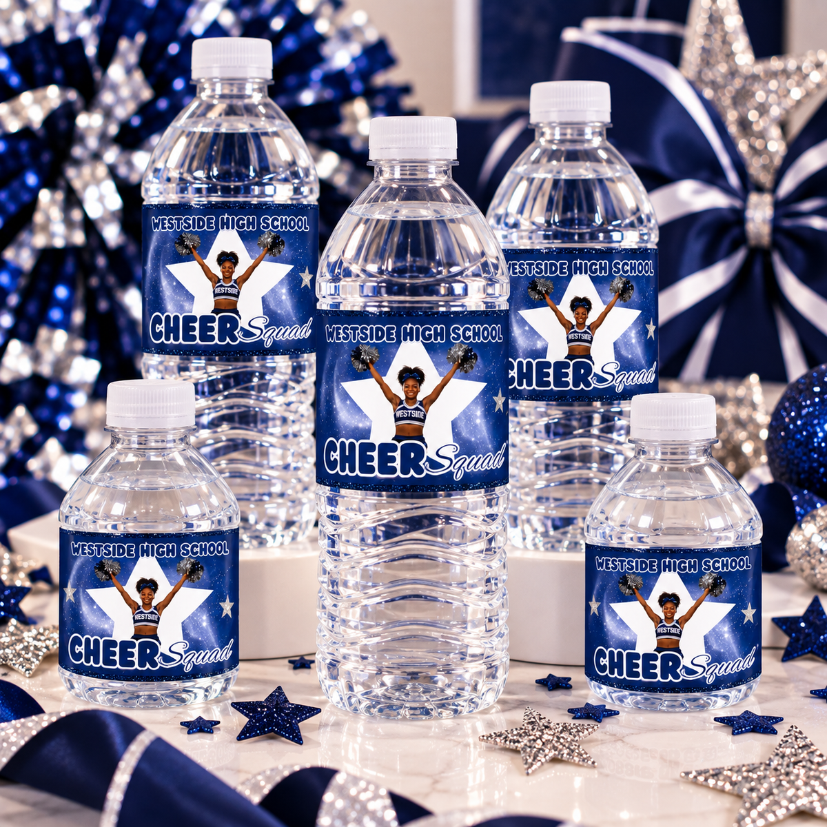 Personalized Westside High School Cheer Squad water bottles with navy blue, white and silver cheerleading labels.